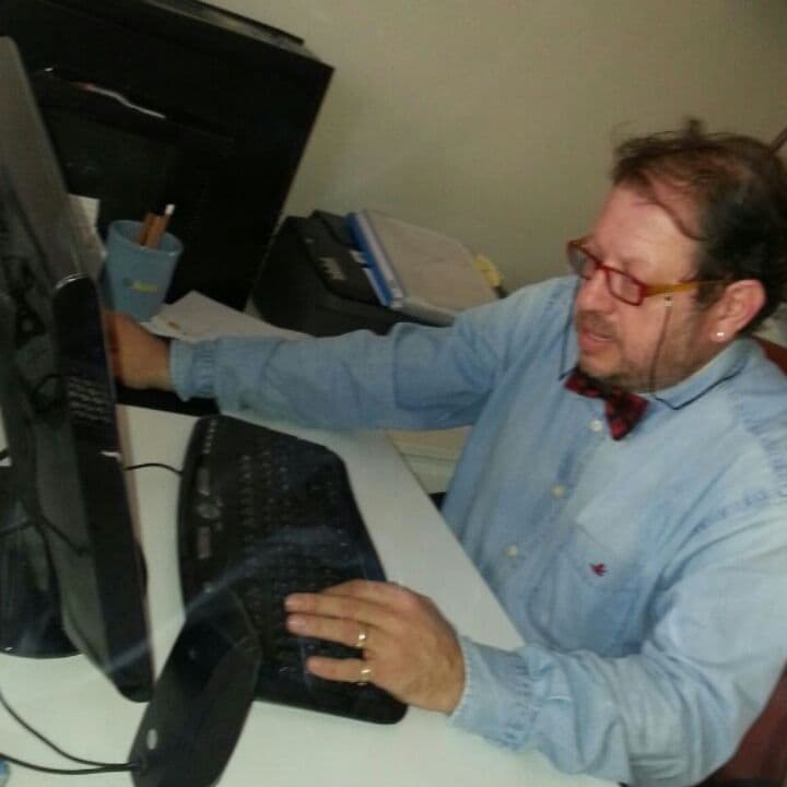 A modern architectural building with clean lines and a unique geometric shape, reflecting innovation and design.